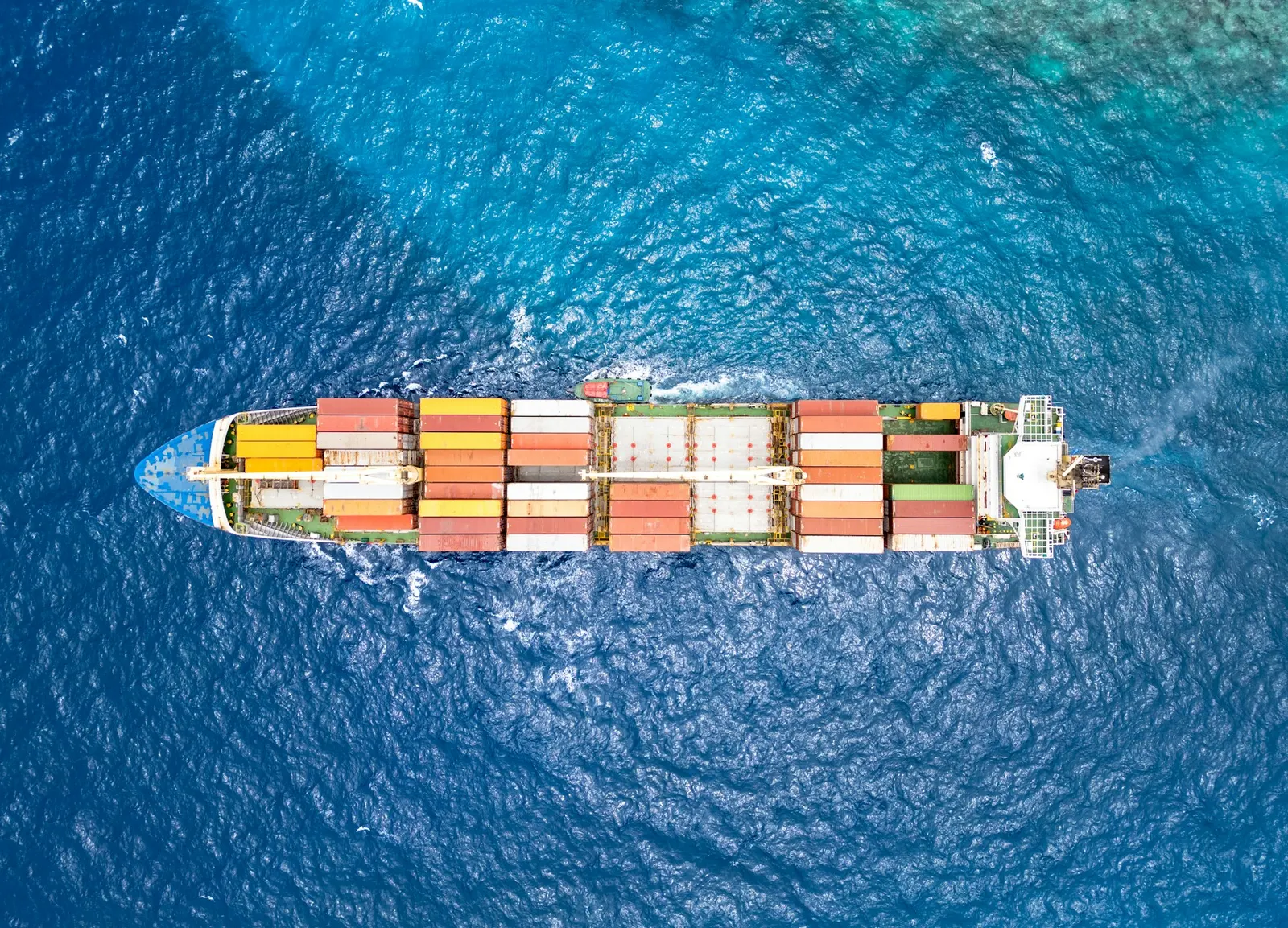 Aerial view of a container ship underway at sea